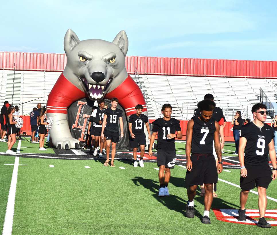 MEET THE LOBOS - Athletes, band members, cheerleaders, fans, parents and school administration joined in to kick off the 2026 f all sports season this pas t Friday as well as cut the ribbon on the HCCU Lobo St adium. (staff photo)
