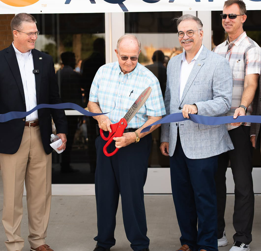 South Plains College Board of Regents Chairman Mike Box was joined by SPC President Robin Satterwhite, board of directors, city administration and businesses to cut the ribbon on new Aquatic Center.