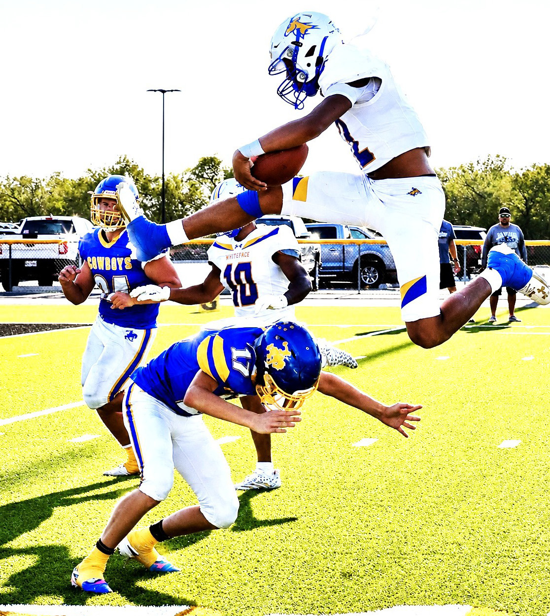 First Games of Season - Football action officially got underway for teams in Hockley and Cochran County for seven high school varsity teams. Three teams kicked off their season with big wins including Levelland, Whiteface and Anton. Shown is Whiteface Antelope Isaak Soliz clearing the defense. (Photo by Holly Crutcher)