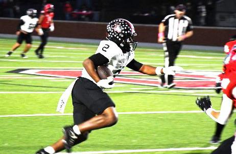 A Levelland Lobo ball carrier charges down the field in the game against Borger.