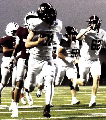 LHS Lobo charges down field for a touchdown. (staff photo)