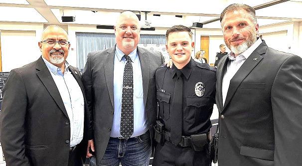 Logan Bartlett is a 2026 graduate of South Plains College’s Law Enforcement Academy. Shown are (left to right) SPC Technical Education Dean Albert Garcia, Law Enforcement Instructor Shawn Wilson, Bartlett and SPC Professional Services and Energy Department Chair Kenny Burns. (photo courtesy of South Plains College)