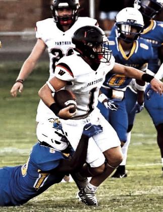 Whitharral Panther Hudson Prowell works to gain ground on a carry against Boys Ranch this past Friday. (Whitharral ISD photo)