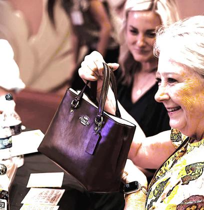 DESIGNER BAG BINGO - Participants enjoyed an evening of bingo to raise more than $45,000 SPC. (SPC photo)