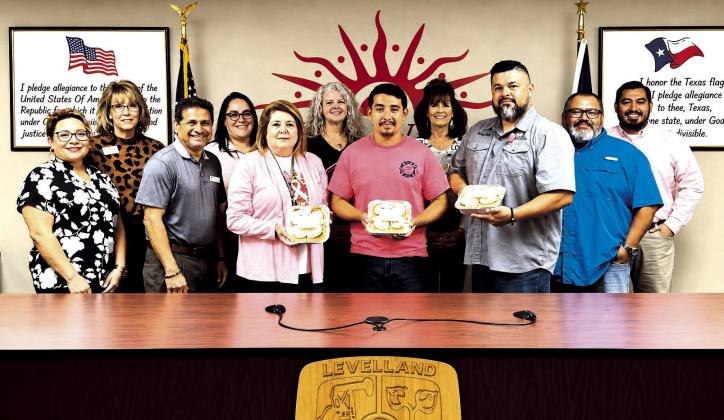 Code Compliance Appreciation: (front, left to right) Angie Covarrubias, Tushar Bhakta, Dina Gaona, Joe Hernandez, Eli Colunga with member of the Chamber of Commerce and city officials.