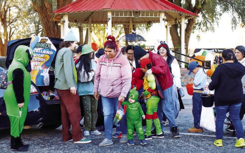 TRUNK OR TREAT - The Levelland Main Street and Levelland Noon Lions Club held the annual Trunk or Treat in downtown Levelland, October 31. The event went from 6 p.m. to 8 p.m. with a haunted house, games, costume contests and free candy being the main attractions. Community members were encouraged to participate and bring their children and families to enjoy the event. (Staff photo by Aalijah Soliz)