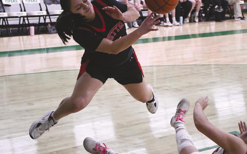 EXTRA EFFORT- The sixth ranked Levelland Loboettes eliminated the Bridgeport Sisses, 44-18, in Hamlin Friday evening to become the 4A Region 1 Area Champions. Loboette Angelica Gonzales dove to the ground as she saved the ball from going out of bounds. (Staff Photo by Dom Puente)