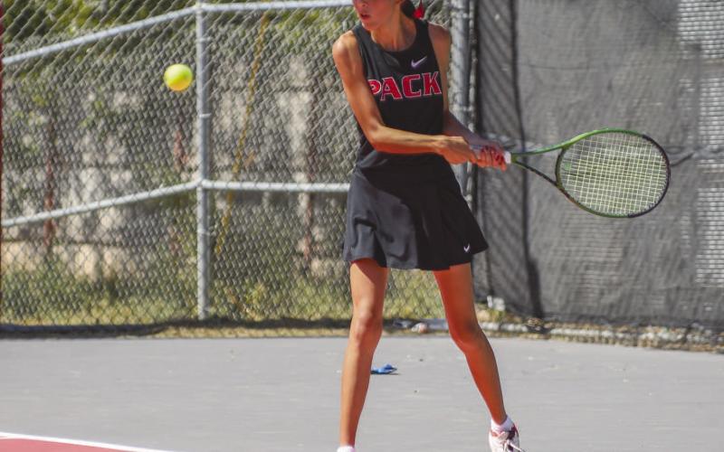 FOCUS ON THE BALL - LHS Varsity Tennis competed against Seminole’s varsity unit this past Tuesday at the LHS tennis courts. Pictured is Fabiola Hernandez establishing a good base to return a Seminole serve during her doubles match. (Staff photo by Dom Puente)