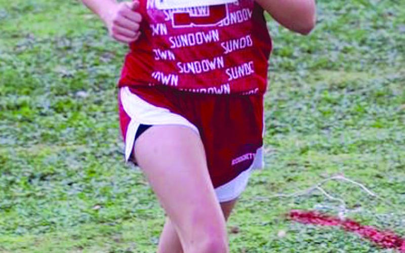 DISTRICTCHAMP- Sundown Middle School eighth grader Kassady Rodgers earned the title of district champion, as she completed the two mile course in 13:41.90. She trailed throughout the duration of the race and made a sprint to the finish on the last 200m of the race to take the lead. (Photo Courtesy of Sundown ISD)