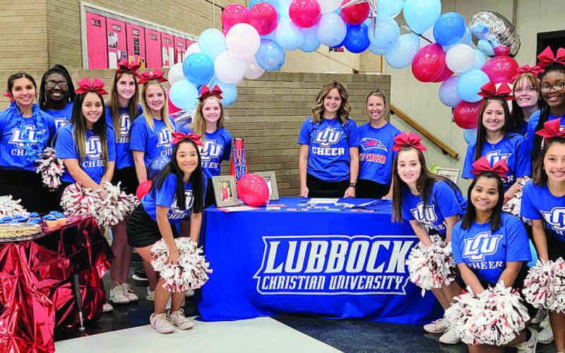 SIGNED WITH LCU!– Levelland High School senior Cooper Wallace, sighed recently to cheer at Lubbock Christian University. Cooper plans to graduate from LHS in May of 2023, and continue her education at LCU to major in Animal Science. Cooper is the daughter of Ashley and Sheriff Ray Scifres of Levelland. Pictured with Cooper is Head Cheerleading Coach for LCU Whitney Sales and the Levelland High School cheer squad in LCU swag. (Submitted Photo)