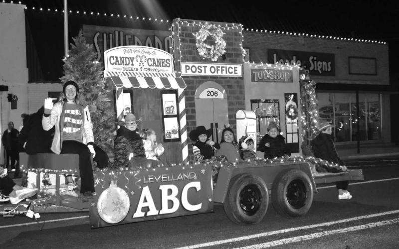 PARADE TIME - The ABC School participated in the Mainstreet Lighted Parade on Thursday. Best Student float received $500 or best overall Traveling Trophy. What a great way to start the Holiday.(Staff photo by Emily Campos)