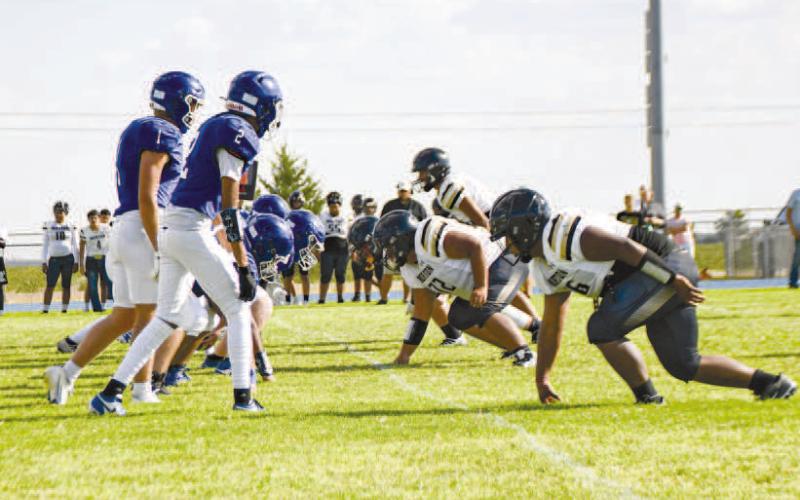 LINE OF SCRIMMAGE – Smyer and Morton line up for a play against each other during their football scrimmage this past Thursday at Bobcat Stadium. (Photo by Jentezen Smith).