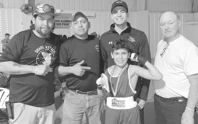 GOLDEN GLOVES- The Levelland Boxing Center Shark Attack Boxing Team competed in the Lubbock Regional Golden Gloves Tournament February 18th and 19th. Damian Nieland and Enriquiz Olivas won unanimous decisions. Jeremy Phelps lost a split decision. Nieland will compete at the state championship March 14th-18th in Fort Worth, Texas. Coaches for Shark Attack Boxing are: Carlos Olivas, John Espinoza and Sharky Lecroy. (Photo Courtesy of Sharky Lecroy)