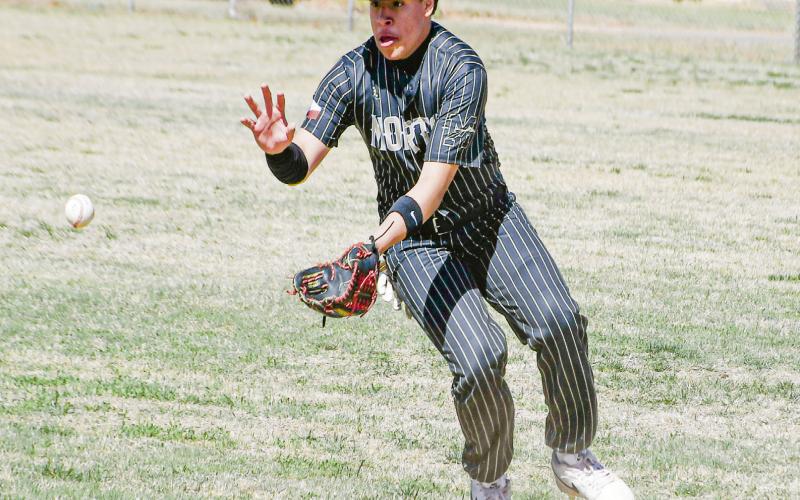 ROUTINE GROUNDBALL - Morton Indian Masyn Enriquez fields a routine groundball at second base during their district game against the Sundown Roughnecks this past Tuesday at Morton High School. (Staff photo by Jentezen Smith)