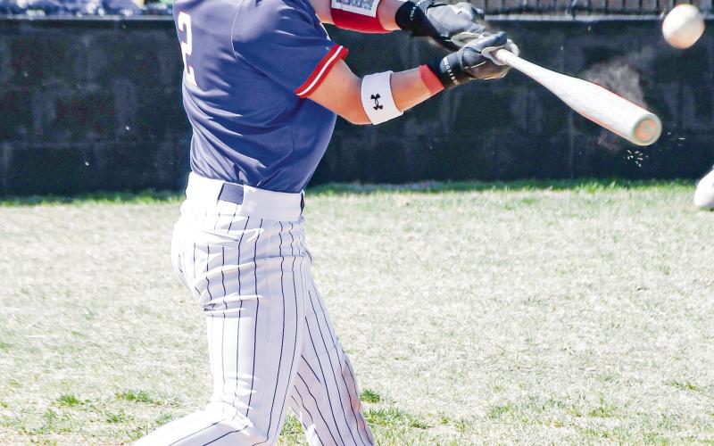 PUT A SWING ON IT - Sundown Roughnecks Ryland Baldwin swings and squares up the baseball during their district game against the Morton Indians this past Tuesday at Morton High School. Baldwin went 1/2 with an RBI in the loss. (Staff photo by Jentezen Smith)