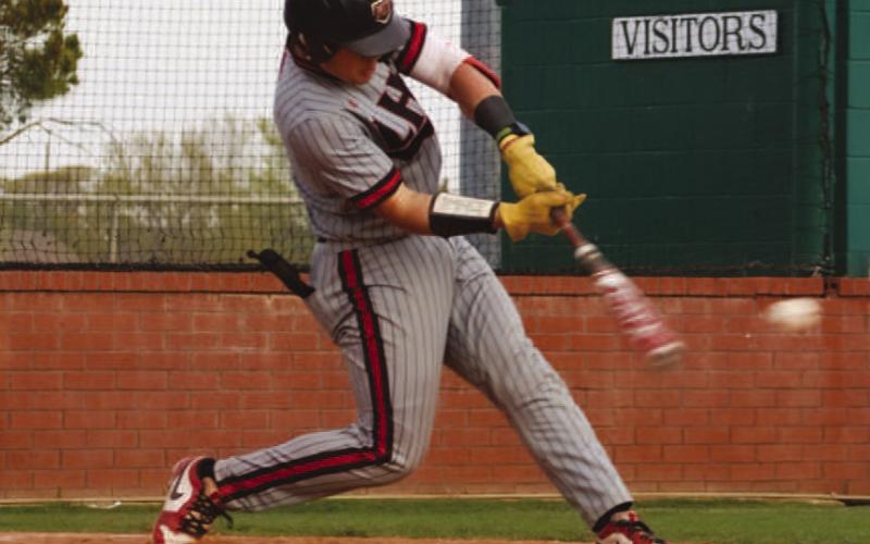 MOONSHOT - Levelland Lobo Rusty Johnson swung at the ball during the team’s game against the Sweetwater Mustangs last Friday at home for district play. (Staff photo by Aalijah Soliz)