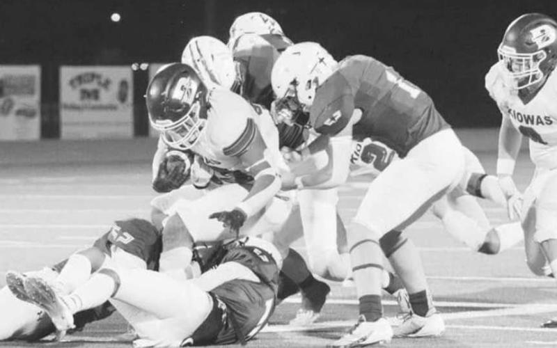 DOWN YOU GO - The Whiteface Antelope run defense was out in force on Nov. 22, holding Booker to 36 yards rushing in a 66-16 UIL Class 1A-1 six-man high school football area round action in Tulia. The Antelopes will be in Lockney tonight facing Borden County in Lockney tonight at 6 p.m. in the regional quarterfinal round. (Photo by Holly Crutcher)