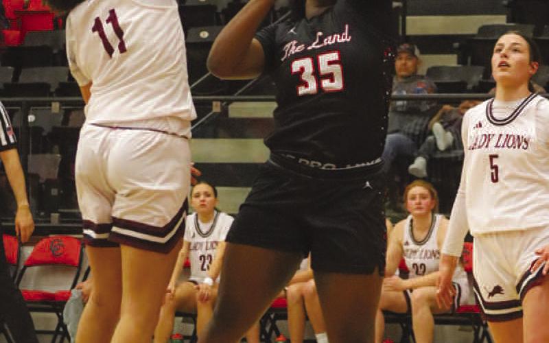TOUGH SHOT - Levelland Loboette Sydnii Joyce shot through the contact during the team’s game this past Monday night on the road. (Staff photo by Aalijah Soliz)