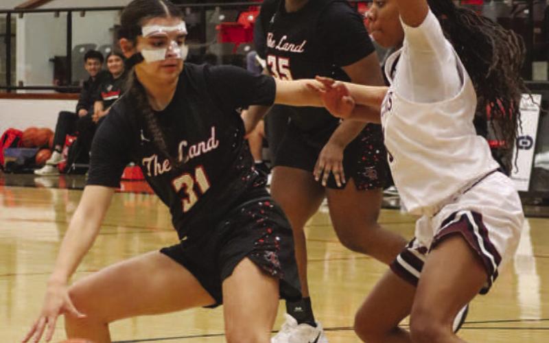 BALL SECURITY - Levelland Loboette Leilani Sanchez guarded the ball close to her during the team’s game against Brownwood this past Monday. (Staff photo by Aalijah Soliz)