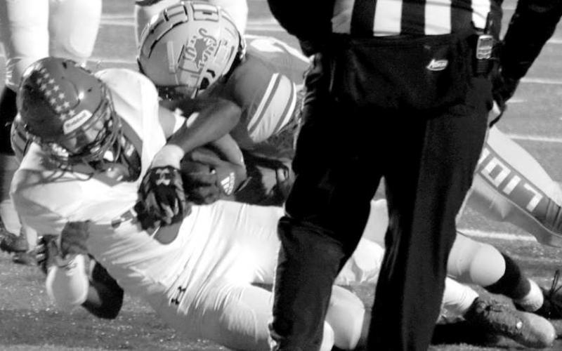 POWER RUN- Sundown Roughneck Alex Bocanegra powered across the goal-line in a road loss to New Deal last Friday. The Roughnecks will play host to the Tahoka Bulldogs on Friday. (Photo Courtesy of Chris Bratcher)