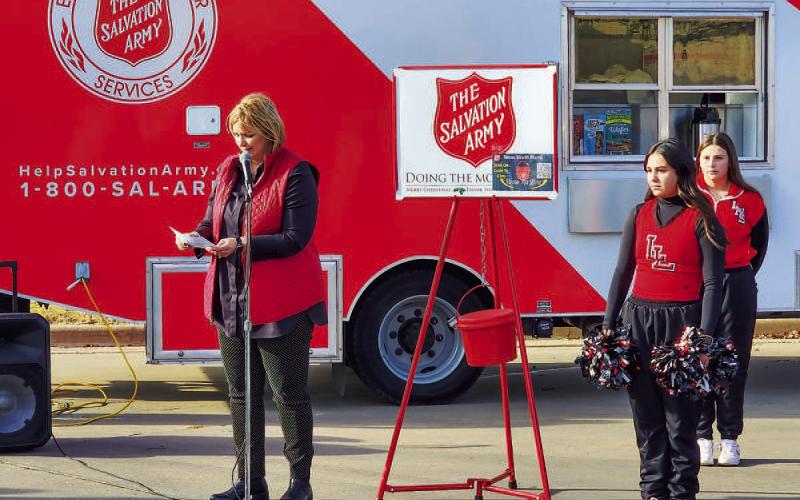 SEASON OF GIVING - The Hockley County Salvation Army unit hosted their annual Red Kettle Kick-Off Tuesday afternoon at the United Supermarket parking lot in Levelland. Levelland ISD School Board Vice President DeEtte Edens spoke to the crowd in attendance talking about the Salvation Army and how community members can volunteer their time this holiday season. (Staff photo by Dom Puente)