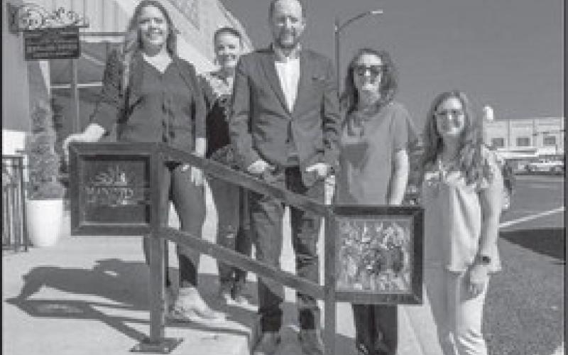 FANTASTIC MOSAICS - The Levelland Main Street group recognized Tanner Terrell of Edward Jones for his participation in the Main Street Revitalization efforts. Pictured from left to right are: Viviana Perez, Meleta Atchison, Tanner Terrell, Iris Keeling and Tania Moody. (Staff photo by Dom Puente)