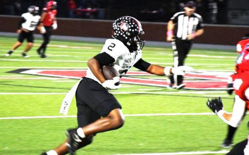 A Levelland Lobo ball carrier charges down the field in the game against Borger.