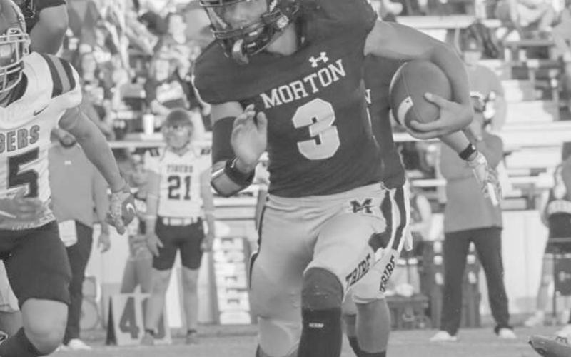 DOWN THE LINE - Morton Indian A.J. Mendoza ran down the line of scrimmage to turn the corner on the defense this past Friday against Slaton. (Staff photo by Aalijah Soliz)
