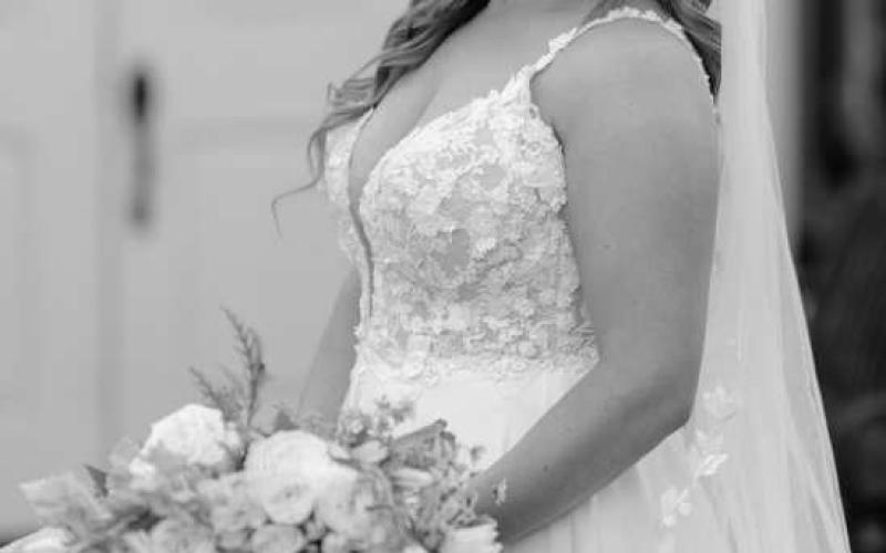 MRS. TRAVISALLEN BELL..nee Katherine Nicole Phelan