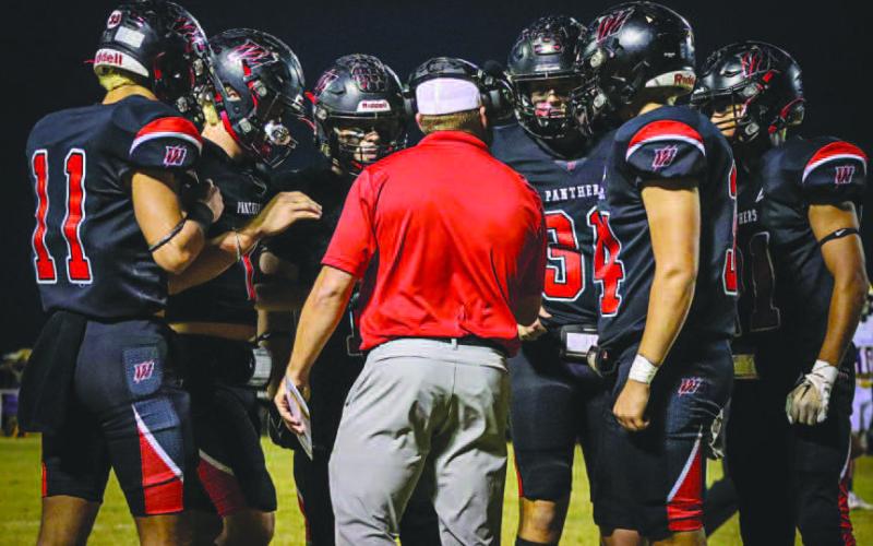 HUDDLE UP - The Whitharral Panthers huddled up during the team’s game on Senior Night against the Anton Bulldogs. The Panthers finished off their season against the Sands Mustangs this past Friday night in Jayton in the Bi-District round of playoffs. (Staff photo by Aalijah Soliz)