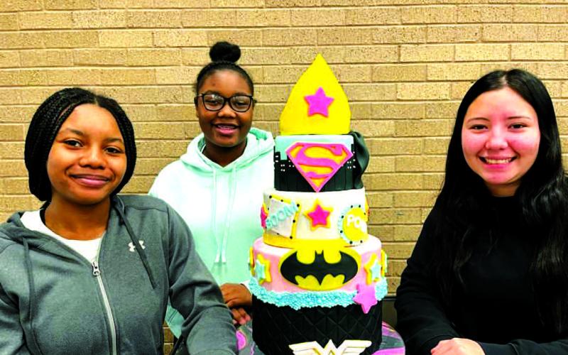SUPERWOMAN- LHS Culinary Teacher Khris Oaks shared the results of her Skills USA State Competition in Corpus Christi last week. These students created Marvel Character cakes. They brought home six State Superior. Pictured isSuper Woman: Mackenzie Dominguez, Destini Jones &amp;amp; N’Ya Washington-2nd Place (Photo courtesy of courtesy of Cristal Isaacks)