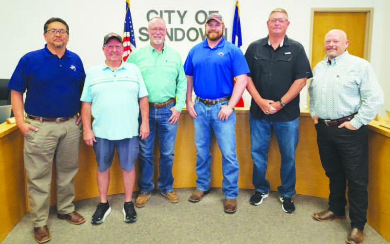 OPPORTUNITY FOR GROWTH - The City of Sundown announced the acquisition of several properties from Sabinal Energy through donation during their March City Council meeting. Pictured from left to right are: City Administrator Billy Hernandez, Alderman Doug Barry, Sabinal North District Operations Superintendent Craig Blair, Mayor Jonathan Strickland, Alderman Ron Holson, Alderman Dr. Brett Fryar, Alderman not pictured were Dennis Heatherly and Lonnie Geisler. (Staff photo by Dom Puente)