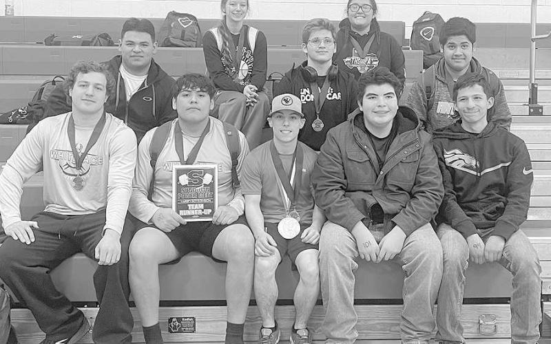 FIVE STRAIGHT- The Whiteface Lady Lopes earned their fifth straight district championship with a 67-11 domination of the visiting Amherst Lady Bulldogs. Pictured left to right are: Head Coach Gary Simmons, Taryen Turnipseed, Abbi Soliz, Jaedyn Rector, Tymmyah Olenga, Morgan Waggoner, Emma Ayers, Kylie Deavours, Allison Martha, Ximena Lucero, Ariana Soliz, Anais Soliz, Sarai Lucero and Assistant Coach Brian. (Photo Courtesy of Holly Crutcher)