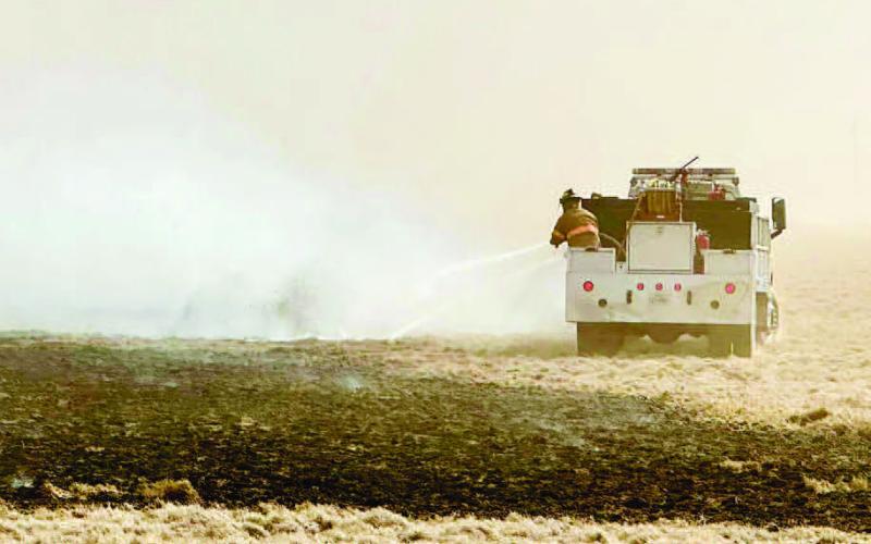 BATTLING FIRE CONDITONS - The Levelland Fire Department responded to several grass fire calls on Tuesday. A large portion of the region was placed under a rangeland fire warning which spanned the weekend and ended Tuesday evening. (Photo courtesy of LFD)
