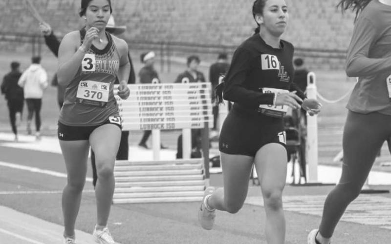 3200 METERS - Levelland Loboettes Evelyn Medias and Ariana Lopez competed in the 3200 m run last Friday at Lowry Field for the prelims where Medias placed 13th and Lopez placed 16th. (Staff photo by Aalijah Soliz)