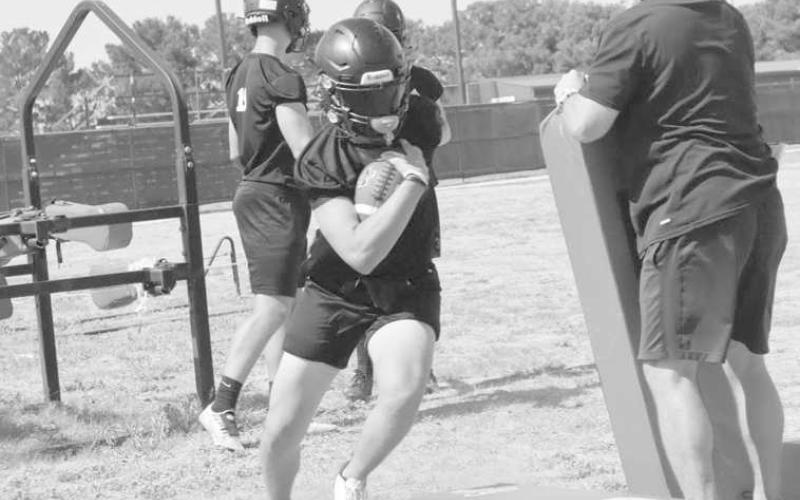 QUICK CUTS - Levelland running back hit the gap quick to show off his fast footwork during skill drills (Staff photo by Aalijah Soliz)