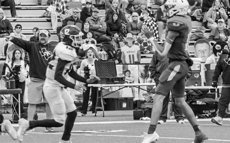 UNDER PRESSURE - Whiteface Antelope Isaak Soliz threw a good pass to his receiver under pressure from the Water Valley defense in Lamesa during the team’s semi-final game. The Antelopes played against the Gordon Longhorns today at 2 p.m. for the State Championship. (Staff photo by Aalijah Soliz)