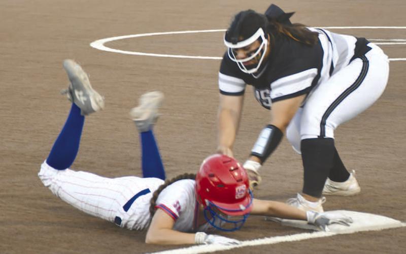 SAFE AT THREE- Emry Jourdan was safe at third in an 11-4 Sundown loss to the no. 16 Forsan Lady Buffs last Thursday in UIL Class 2A High School Bi-District Softball action. Jourdan scored a run and a hit in the effort. (Photo Courtesy of Jay Kelley)