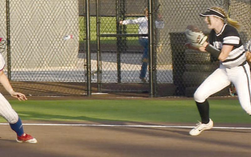 IN A PICKLE- Allie McCormick was caught in a rundown in the bottom of the third inning in an 11-4 Sundown loss to the no. 16 Forsan Lady Buffs last Thursday in UIL Class 2A High School Bi-District Softball action last Thursday. McCormick had a run, two hits and two RBIs in the effort. (Photo Courtesy of Jay Kelley)