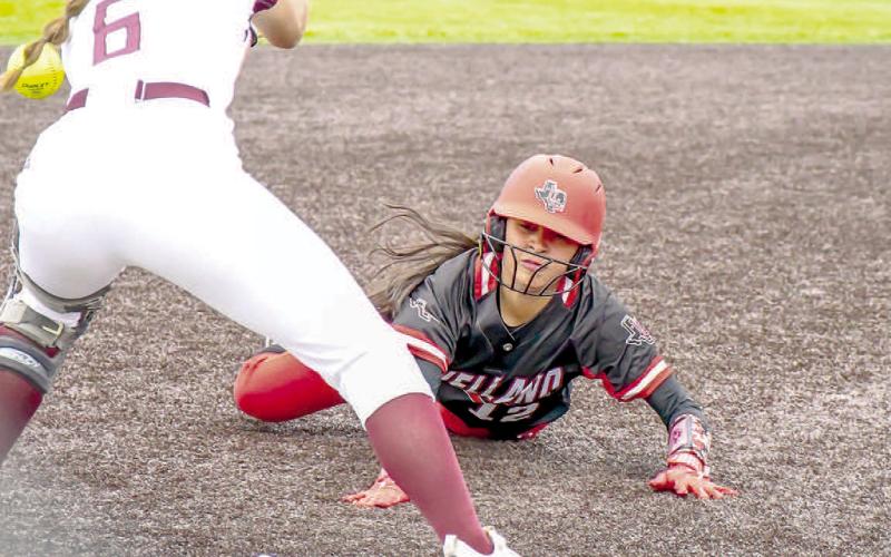 PICK PLAY- The Brownwood Lady Lions completed the sweep over the Levelland Loboettes at Abilene Cooper last weekend. The Loboettes ended their 2023 season 25-9. Loboette Jazlyn Diaz slid into first base head first on a pick-off play. (Staff Photo by Dom Puente)