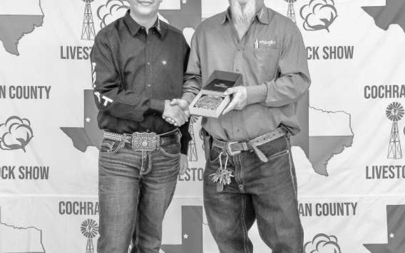 SENIOR RESERVE LAMB SHOWMAN - Noah Jamie received a buckle donated and presented Billy and Sandy Roberts for winning Senior Reserve Lamb Showman at the Cochran County Livestock Show and Sale. (Staff Photo By Essence Childers)