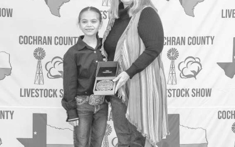 JUNIOR RESERVE GOAT SHOWMAN - Brecken Gates received a buckle donated and presented by T&amp;amp;L Farms for winning the Junior Reserve Goat Showman at the Cochran County Livestock Show and Sale. (Staff Photo By Essence Childers)