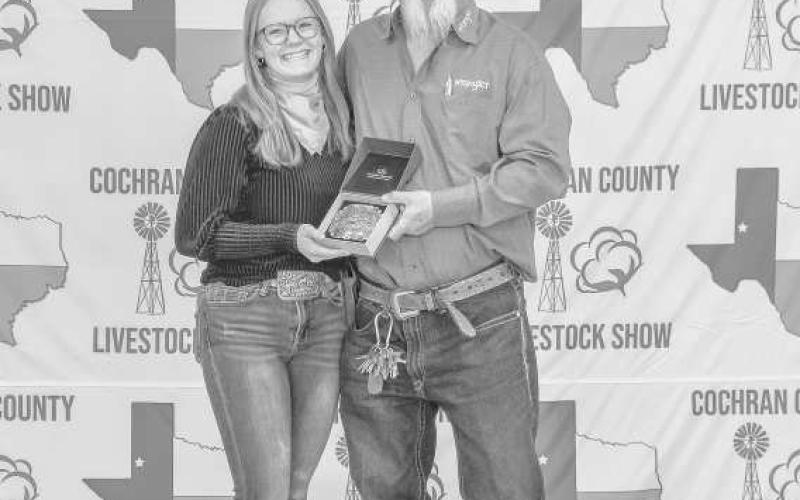 SENIOR RESERVE SWINE SHOWMAN - Emma Kerby received a buckle donated and presentedy Billy and Sandy Roberts for winning the Senior Reserve Swine Showman at the Cochran County Livestock Show and Sale. (Staff Photo By Essence Childers)
