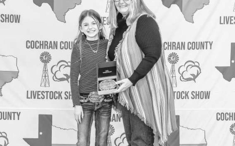 JUNIOR RESERVE RABBIT SHOWMAN - Colyn Smith received a buckle donated and presented by T&amp;amp;L Farms for winning the Junior Reserve Rabbit Showman at the Cochran County Livestock Show and Sale. (Staff Photo By Essence Childers)