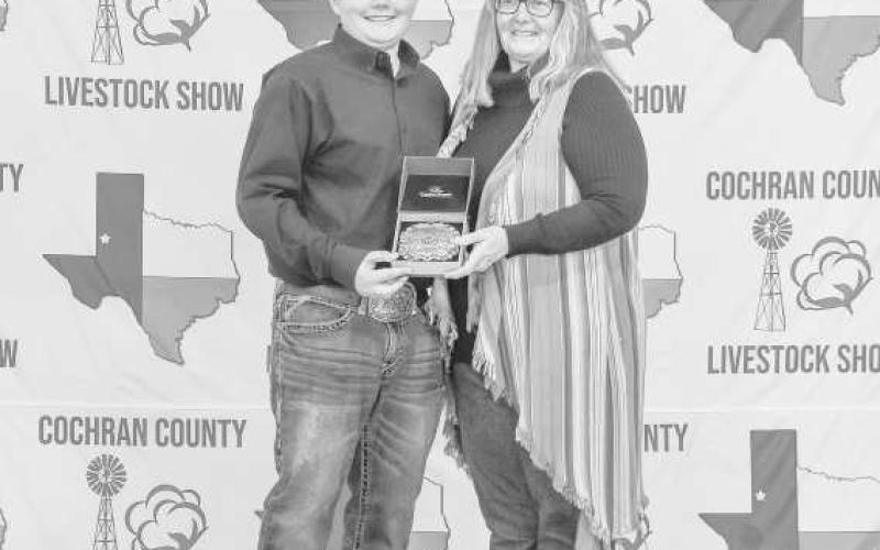 JUNIOR RESERVE SWINE SHOWMAN - Mason Albus received a buckle donated and presentedy T&amp;amp;L Farms for winning the Junior Reserve Swine Showman at the Cochran County Livestock Show and Sale. (Staff Photo By Essence Childers)