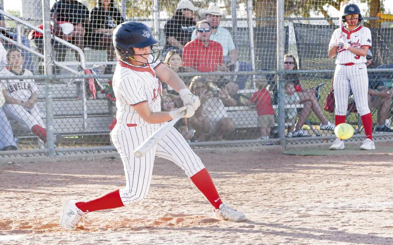 FILE SWINGS IT - Levelland Loboette Tiffany File swings at a pitch during during their district softball game against Estacado this past Friday night at Levelland High School. She’d go ½ with three RBI’s, a run scored and a triple. (Staff photo by Jentezen Smith)