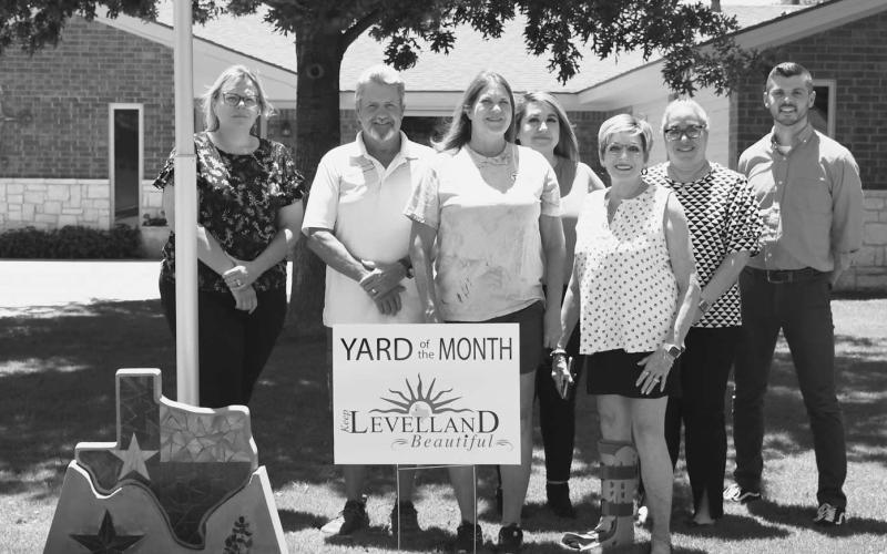 YARD OF THE MONTH - June Yard of the Month was awarded to Angela and Glenn Allen by Keep Levelland Beautiful. Names in no particular order are: Angela Allen, Glenn Allen, Josh Meredith, Janie Morales, Mary Siders, Samantha Davila and Barbara Pinner. (Staff photo by Victoria Byrnes)