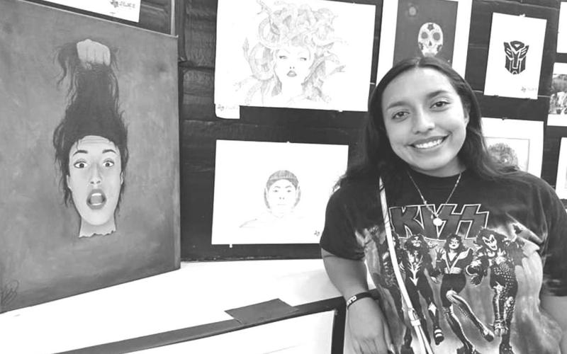 ART EXPO - LHS Art students showcased their work during their annual Art Expo. Pictured is LHS Senior Olivia Velardez with her Medusa. (Photo courtesy of Cristal Isaacks)