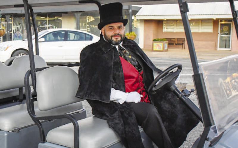 DOORMAN DRIVER – Joe Cavazos drove Ladies Night Out attendees between shops on Thursday night in downtown Levelland. Several downtown businesses participated in the annual event. (Staff photo by Evin Thomas)