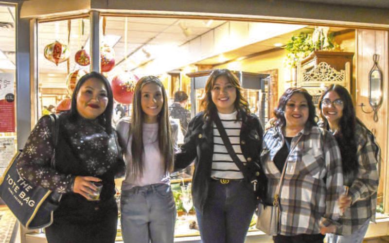 GROUP OUTING – Esmeralda, Paris, Sara, Crystal and Abigail smiled after browsing Atchison’s Jewelry while attending Ladies Night Out in downtown Levelland on Thursday. (Staff photo by Evin Thomas)